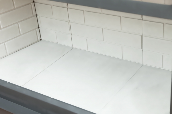 Каминная топка пристенная с черным шамотом и подовым горением Экокамин Вега 1200PB